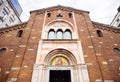 Milan. Facade of Basilica di San Babila in Milan. Church with Clock Tower. Square Piazza Babila