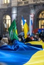 Milan, 24 Feb 2022. Ukranian and Russian flags on protest meeting against russian war in Ukraine near Vittorio Emanuele