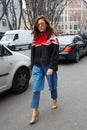 Eleonora Carisi poses for photographers before Emporio Armani fashion show, Milan Fashion Week Day 3 street