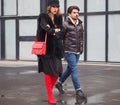 MILAN - FEBRUARY 22, 2018: Fashionable couple street style outfit