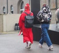 MILAN - FEBRUARY 22, 2018: Fashionable couple street style outfit