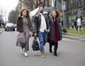 MILAN - FEBRUARY 25, 2018: Fashionable people walking for photographers before ARMANI fashion show, during Milan Fashion week 2018