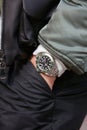 Man with green Rolex Submariner watch before Cristiano Burani fashion show, Milan Fashion Week street style Royalty Free Stock Photo