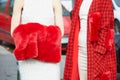 Women poses for photographers with red and white clothes with fur details before Gucci fashion show, Milan Royalty Free Stock Photo