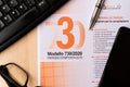 Milan, Italy - 20 april 2020: close up of `modello 730` the tax form declaration income revenue, symbol of italian taxation , pe