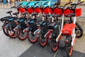 Milan, Italy - April, 12, 2025: Electric rental bikes parked at bike-sharing station near Centrale FS. Milan public