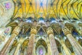 Stone colonnade and carved vault of the Nave in Milan Cathedral, Lombardy, on April 8 in Milan, Italy