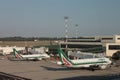 Milan, Italy - aug 2019: Two Alitalia airplanes docking at Malpensa International Airport. Royalty Free Stock Photo