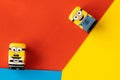 Milan, Italy - August 11 2019: Minion toys characters, prisoner standing on a flat surface and worker climbing up