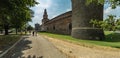 MILAN, ITALY - AUGUST 1, 2019: The Outer Wall of Castello Sforzesco - Sforza Castle in Milan. Super wide panorama Royalty Free Stock Photo