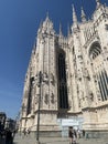 Milan, Italy - August 24, 2022: Partial side view of the facade of the Milan Cathedral Duomo Royalty Free Stock Photo