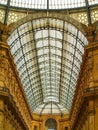 Glass ceiling of The Vittorio Emanuele II Gallery and tourists in the Dome Square in Milan, Italy Royalty Free Stock Photo