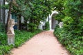 Milan, Italy - Circa June 2021: Italian Villa entrance with garden. Luxurious green exterior