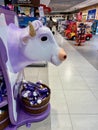 Milan, Italy, 12.04.2022. Close up of purple Milka cow in duty free shop at Malpensa airport.