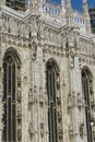 Milan, Italy Duomo architectural detail. Ornate features and artwork across the side view of Milano Roman Catholic Cathedral Royalty Free Stock Photo