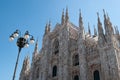 Milan, Italy - 06 17 2016: Duomo cathedral and streetlight with sky copy space Royalty Free Stock Photo