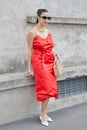 MILAN, ITALY - FEBRUARY 23, 2023: Bettina Looney before Prada fashion show, Milan Fashion Week street style