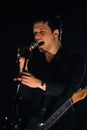 White Lies , The singer and guitarist Harry McVeigh during the concert Royalty Free Stock Photo