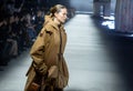 MILAN, ITALY - FEBRUARY 24: Models walk the runway finale at the Tods fashion show during the Milan Fashion Week