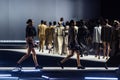 MILAN, ITALY - FEBRUARY 24: Models walk the runway finale at the Tods fashion show during the Milan Fashion Week