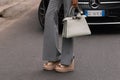 Milan, Italy - February 22, 2023: woman wearing Fendi Peekaboo shoulder bag. Fashion blogger outfit details