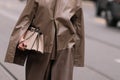 Milan, Italy - February 22, 2023: woman wearing Fendi Peekaboo shoulder bag. Fashion blogger outfit details