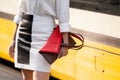 Milan, Italy - February, 21, 2024: woman wears Fendi bag, fashion blogger outfit details