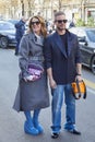 Anna dello Russo with gray Fendi coat and purple sequin bag before Fendi fashion show, Milan