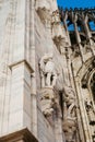 Milan, Italy - January 09, 2022: Close detail of facade of cathedral of Milan, Italy, gothic rosette