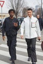 Emmanuel Lawal and Ashton Gohil before Prada fashion show, Milan Fashion Week street style Royalty Free Stock Photo