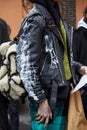 Man with black leather jacket with white designs before Etro fashion show, Milan Fashion Week