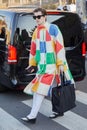 Man with colorful checkered coat before Gucci fashion show, Milan Fashion Week street style