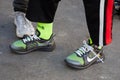 Man with Nike foam transparent sneakers with yellow socks before Fendi fashion show, Milan