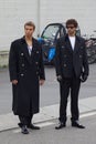 Shae Pulver and Andrew Georgiades before Prada fashion show, Milan Fashion Week street style Royalty Free Stock Photo
