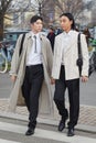 Taiki Takahashi, Noah Lee before Prada fashion show, Milan Fashion Week street style Royalty Free Stock Photo