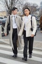 Taiki Takahashi and Noah Lee before Prada fashion show, Milan Fashion Week street style Royalty Free Stock Photo