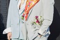 Woman and man with light blue and gray jacket before Gucci fashion show, Milan Fashion Week