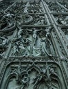 Milan/Italy - July 10, 2016: Detail of the beautiful bas-reliefs on the main bronze door of Milan Cathedral, famous tourist Royalty Free Stock Photo