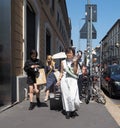 MILAN, ITALY -JUNE 18, 2018:Asian people walking in the street after AALTO fashion show Royalty Free Stock Photo