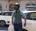 MILAN, ITALY -JUNE 18, 2018: Eccentric man posing for photographers in the street before REPRESENT fashion show Royalty Free Stock Photo