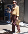 MILAN, ITALY -JUNE 16, 2018:Fashionable man posing in the street before MARNIE fashion show, Royalty Free Stock Photo