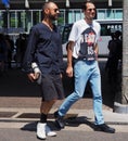 MILAN, ITALY -JUNE 16, 2018: Fashionable men walking in the street before MARNI fashion show, during Milan Fa Royalty Free Stock Photo