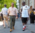 MILAN, ITALY -JUNE 18, 2018: Fashionable people walking in the street before FENDI fashion show Royalty Free Stock Photo