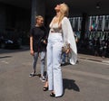 MILAN, ITALY -JUNE 16, 2018:Fashionable woman posing in the street before MARNIE fashion show, Royalty Free Stock Photo