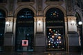 MILAN, ITALY - JUNE 18, 2016: Giorgio Armani and Louis Vuitton stores in Galleria Vittorio Emmanuele II, nicely illuminated at