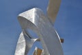Large metallic curved ribbons of the technological statue by Studio Libeskind.