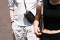 Milan, Italy - June, 16, 2023: man wears Celine bag, street style details, fashion detail Royalty Free Stock Photo