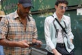 Men with Burberry shirt and white and blue shirt before Emporio Armani fashion show, Milan Fashion