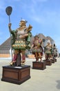 Statue of Fornaro - baker standing in a group of statues of The Food People by Dante Ferretti at the Expo Milano 2015.