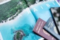 Milan, Italy - June 2023: Travel documents on a tourist magazine ready for the Caraibi tour. Holidays concept. Holiday